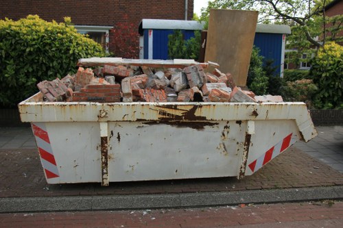 Furniture clearance team removing bulky items from a London property