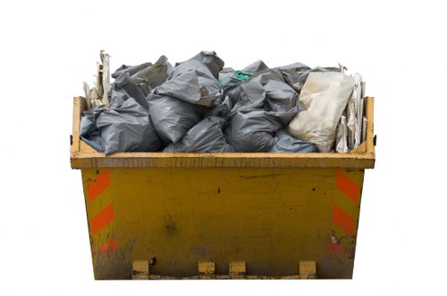 Bulky furniture and household items being removed from a London flat