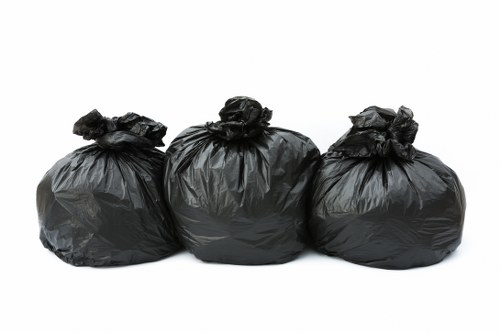 Supervisor assessing a rubbish collection complaint for resolution