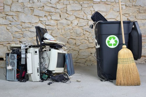 Rubbish clearance team handling household waste in London
