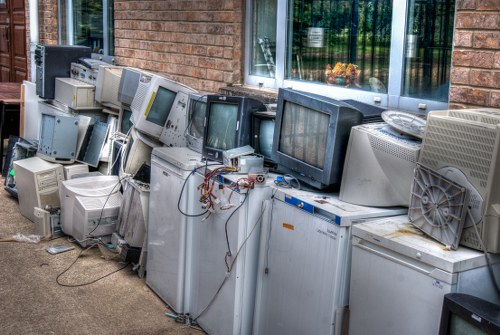 Bulky rubbish and furniture ready for collection from a London property