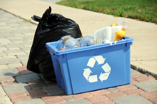 Local rubbish collection service loading mixed waste for disposal