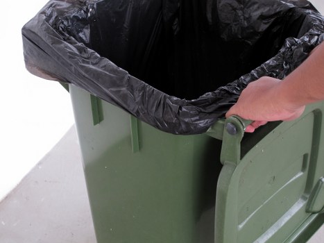 Careful waste sorting in a professional rubbish collection process